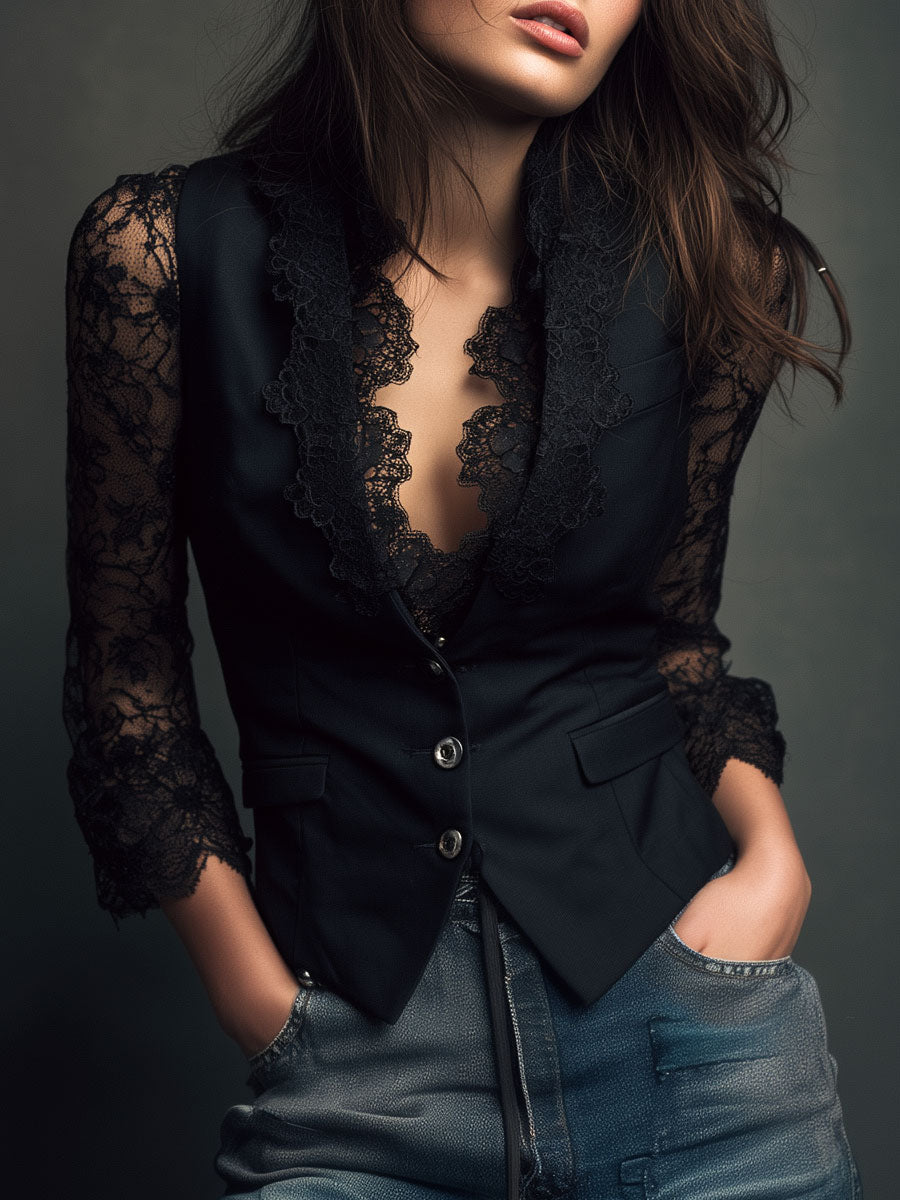 Model in black buttoned waistcoat jacket with lace collar and sheer lace sleeves, hands in jeans pockets 1