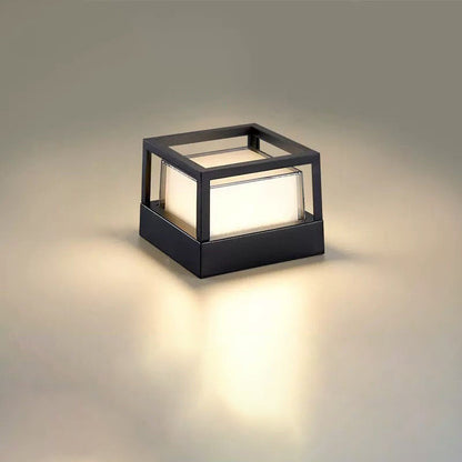 Square black light with an open cage-style top frame and glowing frosted shade, shown on a plain neutral background. 11