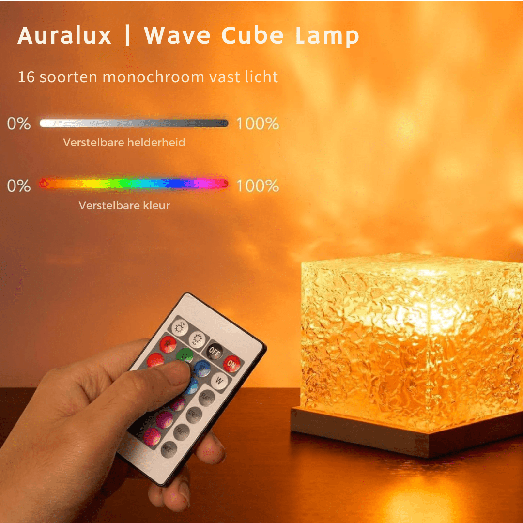 Hand pressing a button on the colour remote control beside a glowing amber cube lamp, with brightness and colour sliders above. 8