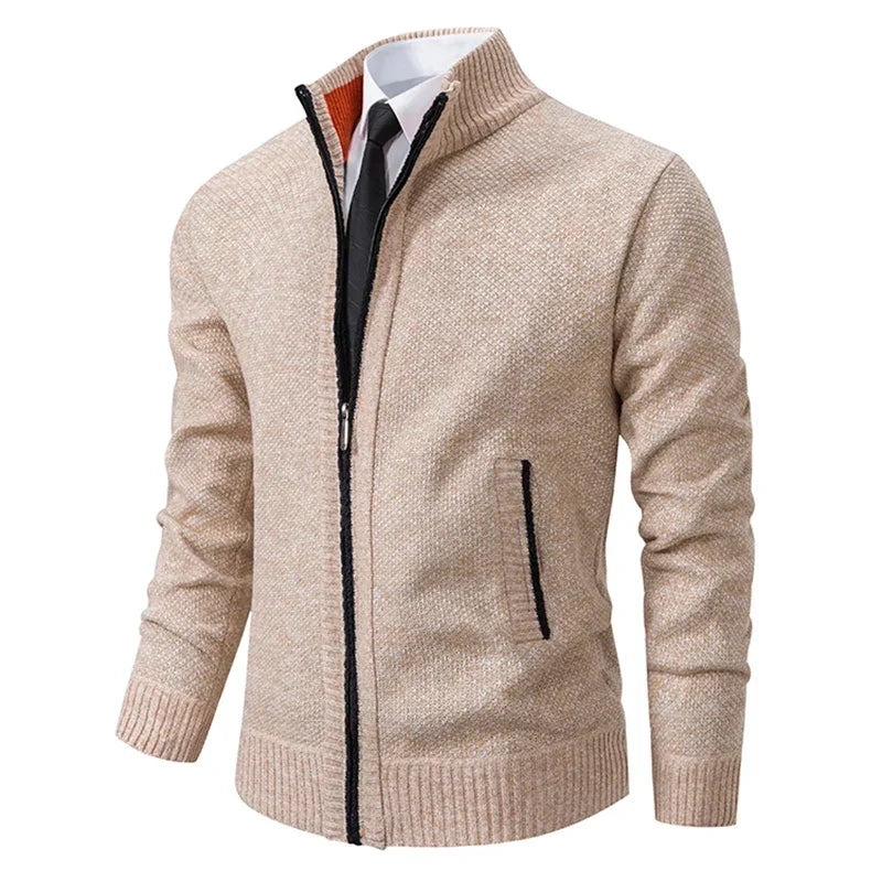 Beige zip cardigan at an angle, showing an orange collar lining and black zip and pocket trim 4
