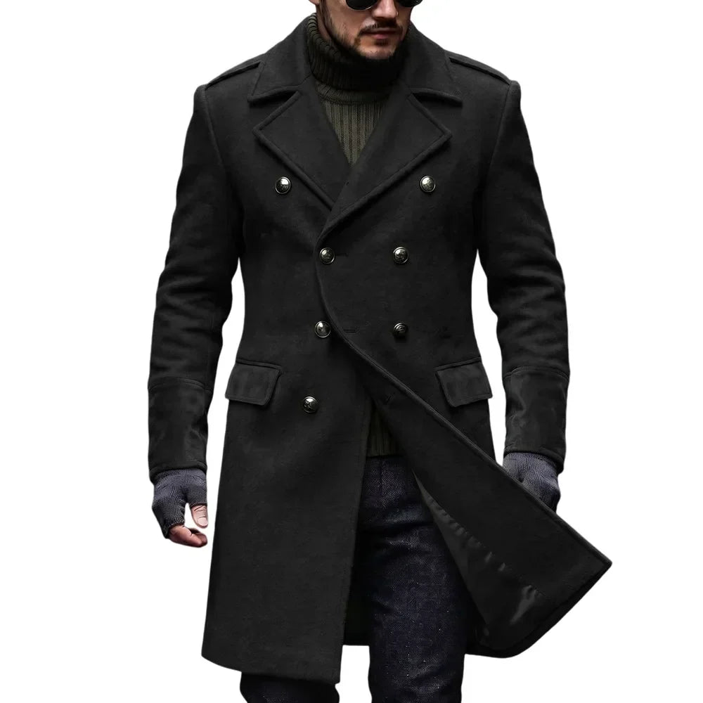 Black overcoat on a model in sunglasses, front open to reveal the dark lining and fingerless gloves 4