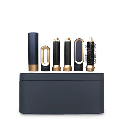 Handle and five attachments arranged above the closed navy storage case on a plain white background 8