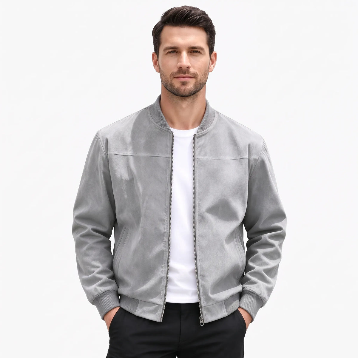 Studio shot of a model in the light grey jacket, zip open, hands in trouser pockets 51