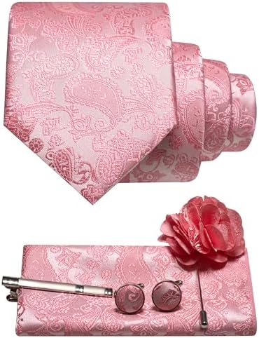 Salmon pink paisley tie set flat lay with rolled tie, pocket square, tie clip, cufflinks and flower brooch. 29