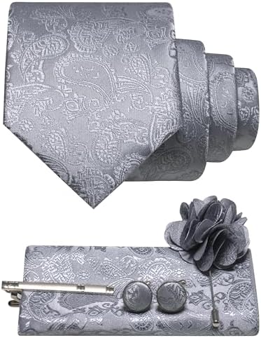 Slate grey paisley tie set flat lay: tie, folded pocket square, tie clip, cufflinks and flower lapel pin. 32