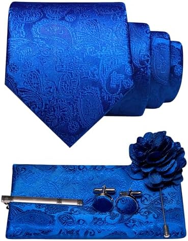 Royal blue paisley tie with matching pocket square, cufflinks, tie clip and flower lapel pin laid out. 10