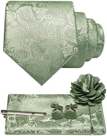 Sage green paisley tie set flat lay: rolled tie, pocket square, tie clip, cufflinks and flower lapel pin. 30
