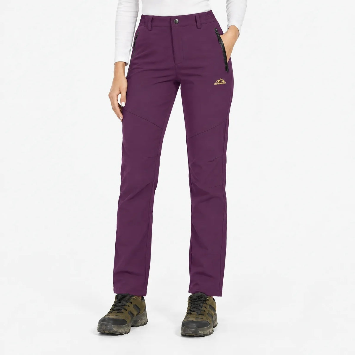 Plum purple trousers worn by a model in a studio, front view with zipped pockets 18