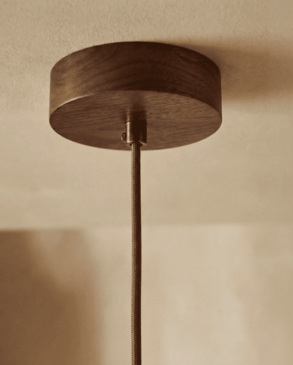 Detail of the round wooden ceiling canopy with the braided fabric cord and metal cord grip 5