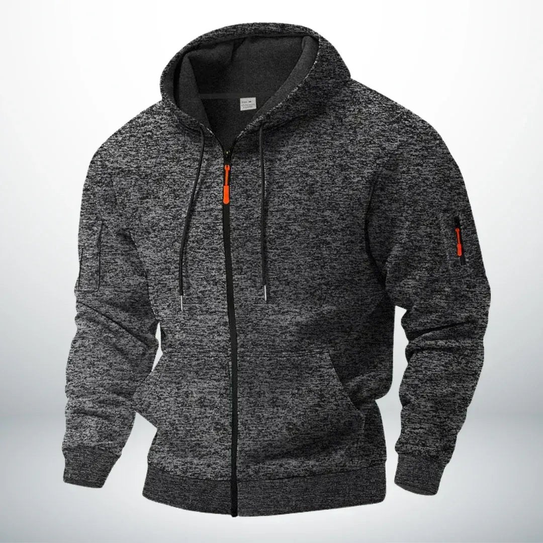 Front view of the zip-up hoodie in speckled charcoal grey, showing the hood, ribbed cuffs and hem, and orange zip pull. 5