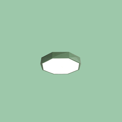 Green faceted octagonal flush-mount light floating against a plain green background 12