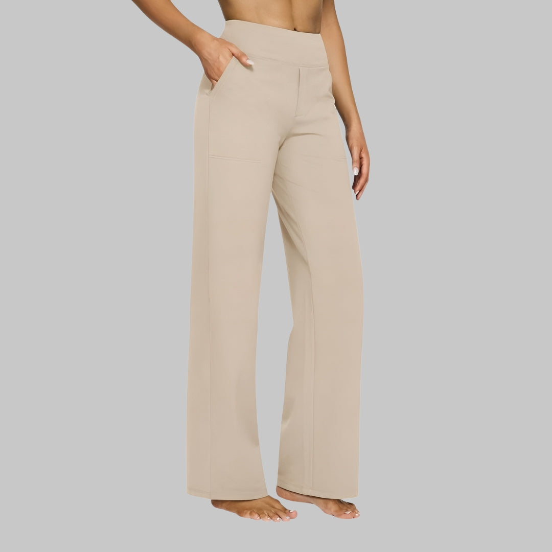 Light beige version of the high-waist trousers, side view, with patch pocket and straight leg. 7