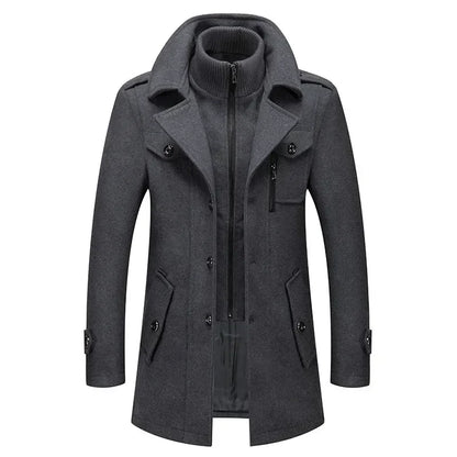 Grey coat from the front, showing the layered knitted collar, chest zip pocket and lower flap pockets 5