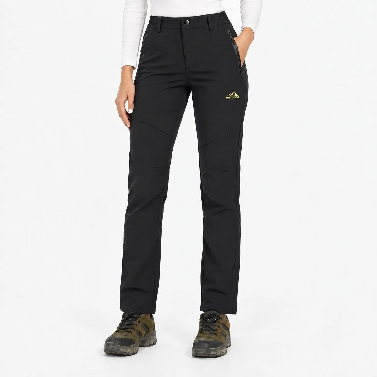 Black trousers worn by a model, front view with hand in zipped pocket 12