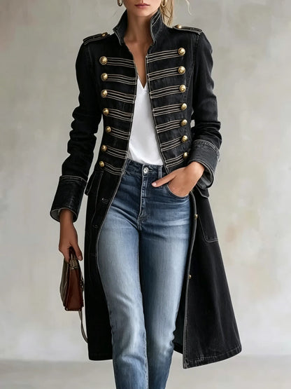 Model wearing the coat in black denim, open over a white top and jeans, with gold buttons and pale braided trim. 9