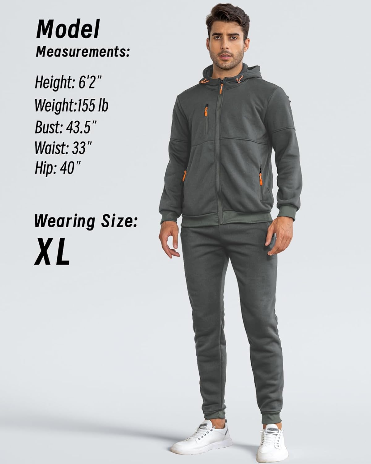 Model in grey hooded tracksuit with orange zip pulls, full-length with a size and measurements panel 8