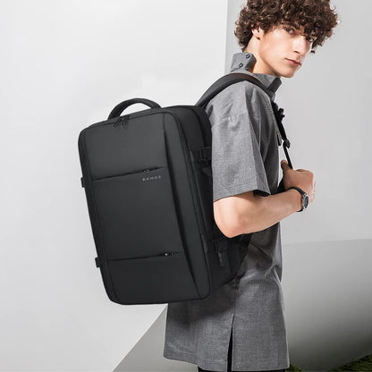 Expandable 26–45 L waterproof travel backpack with laptop compartment and duffel option.