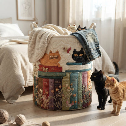 Basket beside a bed, holding a knitted blanket and jeans, while a black cat and a ginger cat sniff around it. 5