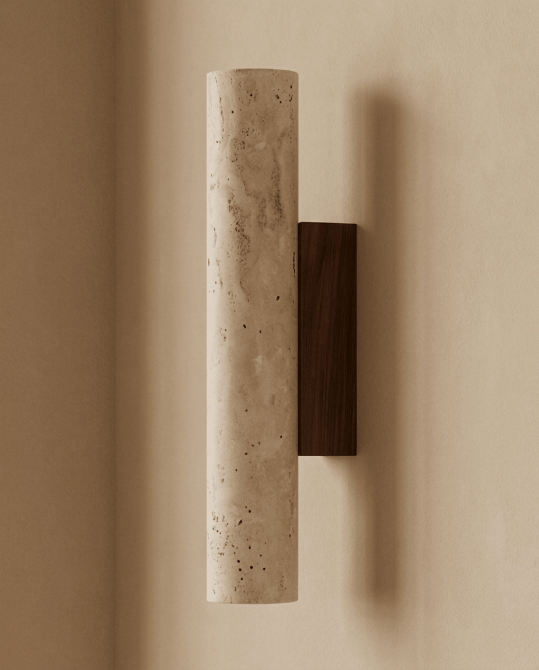 Side profile of the unlit travertine cylinder mounted on its dark wood backplate 6