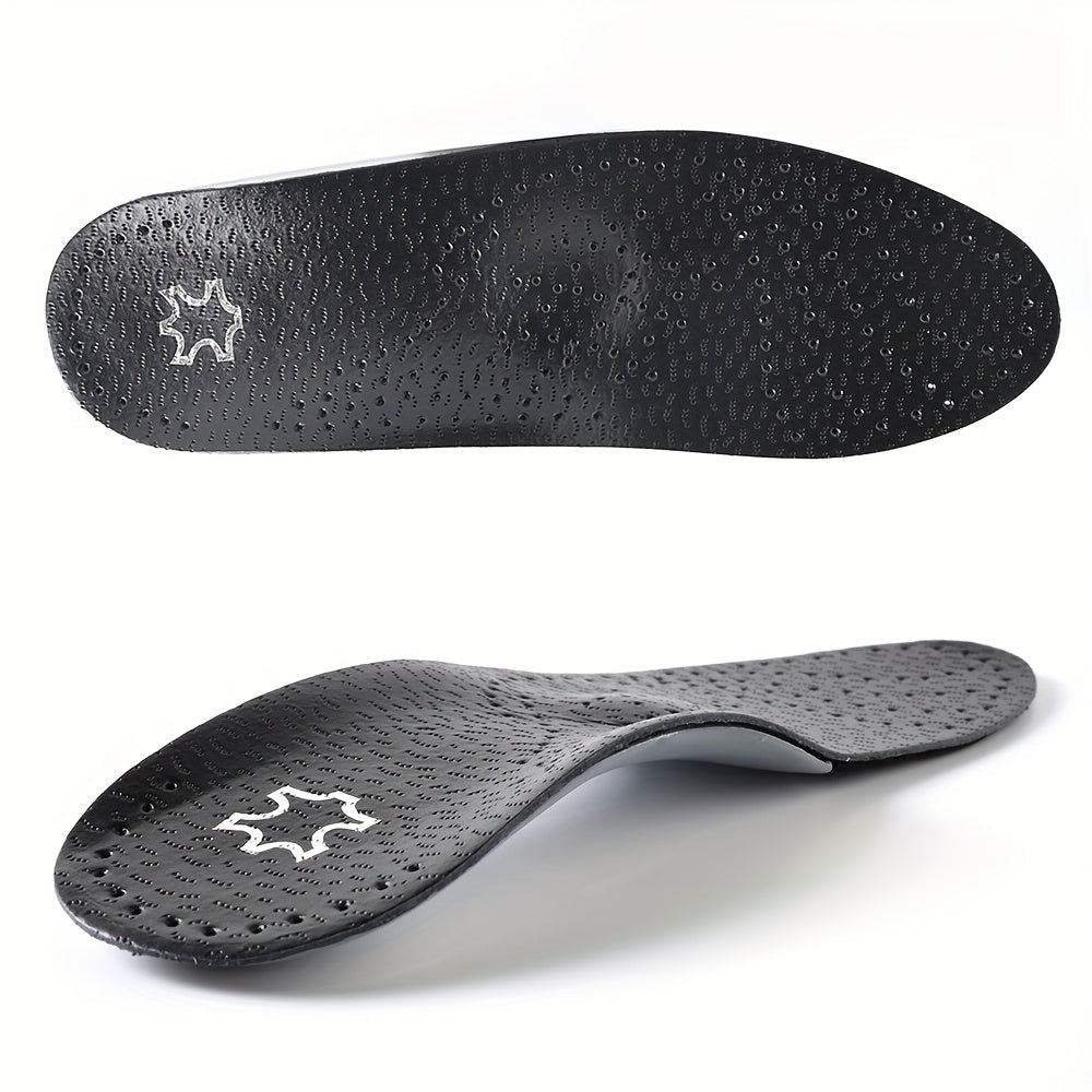 Two black perforated insoles from above and from the side, showing the textured top and the raised curve of the arch. 2