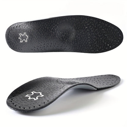 Two black perforated insoles from above and from the side, showing the textured top and the raised curve of the arch. 2