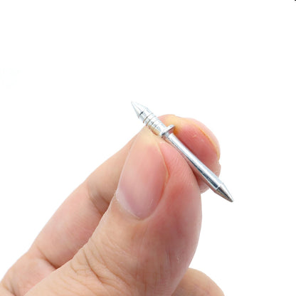 Single silver double-head nail pinched between finger and thumb, showing the ridged tip, central collar and smooth pointed end. 4
