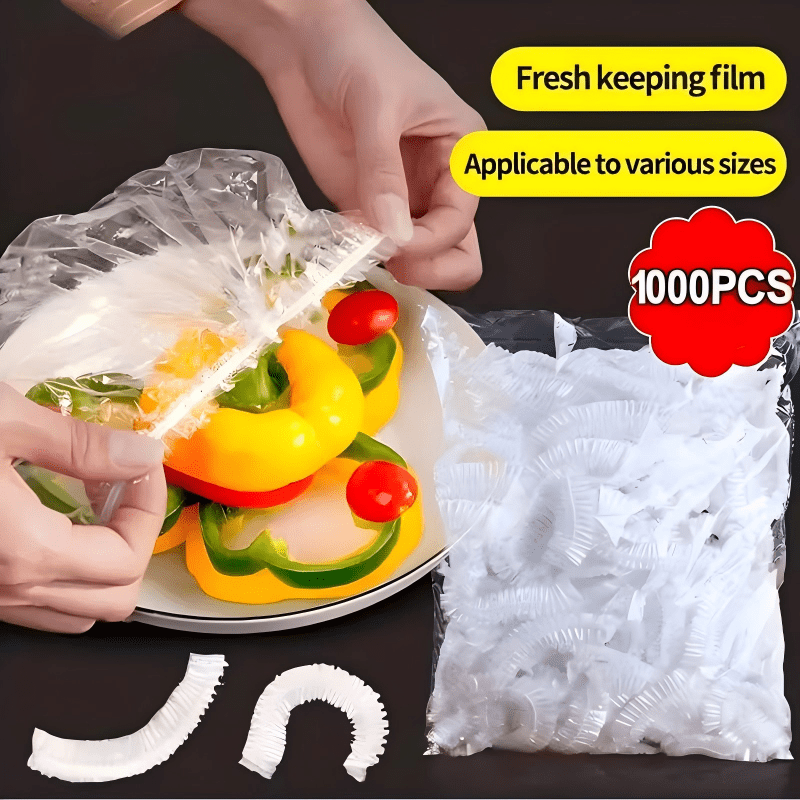 Hands stretching a clear cover over a plate of sliced peppers and tomatoes, beside an open bag of covers. 10