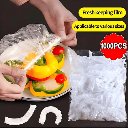 Hands stretching a clear cover over a plate of sliced peppers and tomatoes, beside an open bag of covers. 10