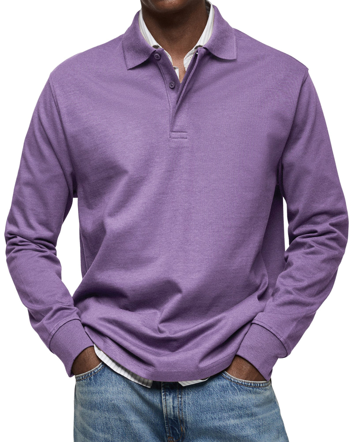 Front view of the polo in purple on a model, collar and button placket visible, worn with blue jeans. 9