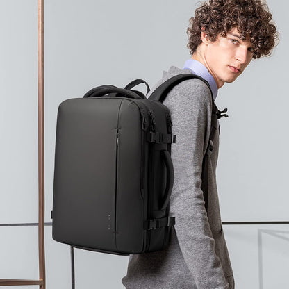 Expandable 26–45 L waterproof travel backpack with laptop compartment and duffel option.