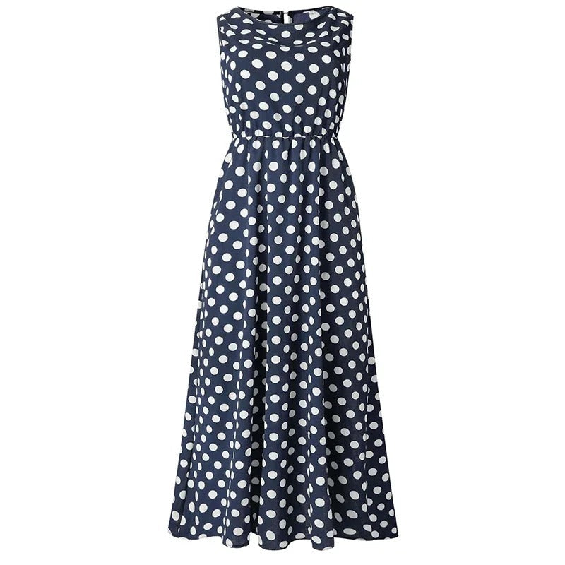 Navy blue sleeveless midi dress with white polka dots, shown flat from the front with an elasticated waist. 6