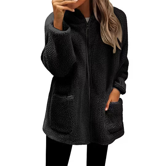Model wearing the zipped fluffy fleece jacket in black, shown against a plain white background 7