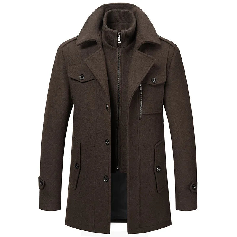 Dark brown overcoat laid flat from the front, with the ribbed zip-up inner layer and flap pockets 7