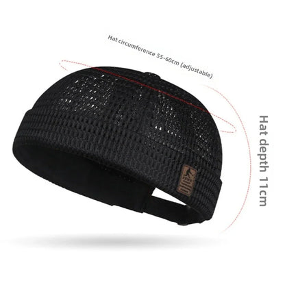 Black mesh cap with dimension lines marking the adjustable circumference and the depth 7