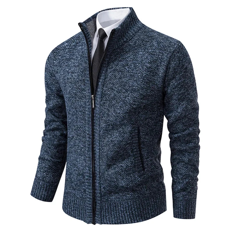 Blue marl zip cardigan at an angle, showing the mottled knit and ribbed cuffs and hem 7