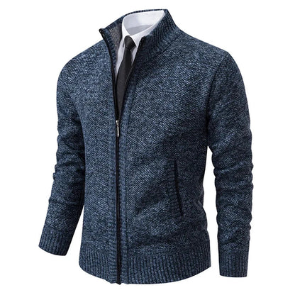 Blue marl zip cardigan at an angle, showing the mottled knit and ribbed cuffs and hem 7