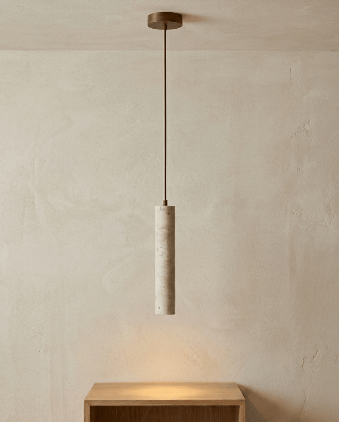 Shorter pendant variant with a veined, paler stone cylinder hanging from a thin metal rod 7