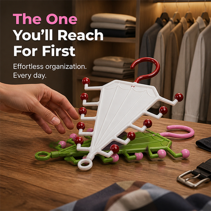 Hand reaching for a white hanger lying on a wooden table, with a green one beneath 6