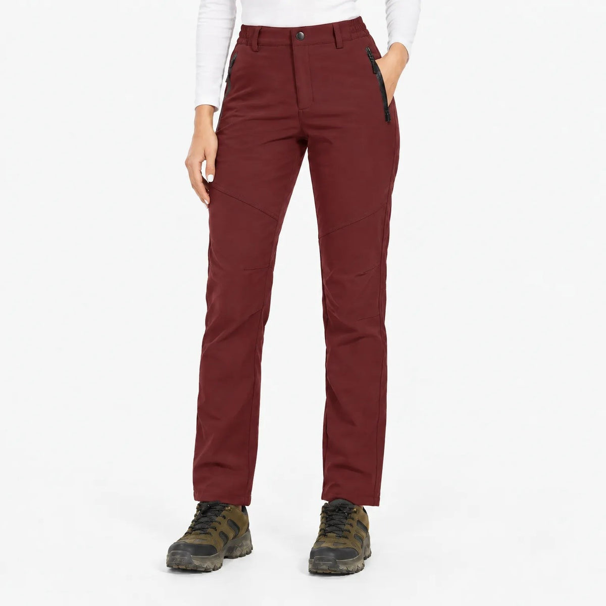 Burgundy trousers worn by a model in a studio, front view with zipped pockets 4