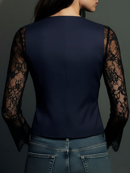 Back view of the navy version with black lace sleeves and fitted back panels 16