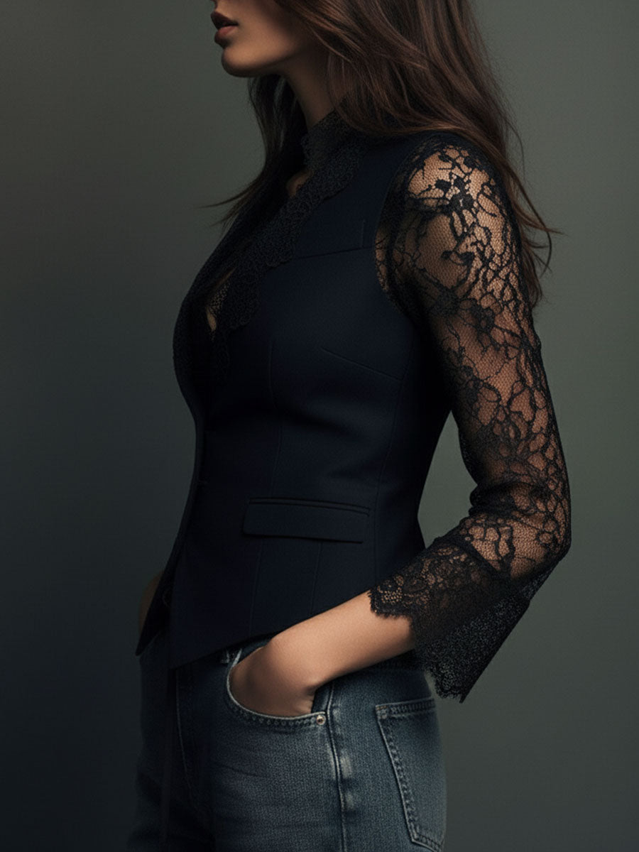 Profile view of the black version highlighting the sheer lace sleeve and structured body 11