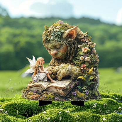 Sleepy moss-covered troll resting its hands on an open book, with a small winged fairy sitting on the page, staked in mossy grass. 2