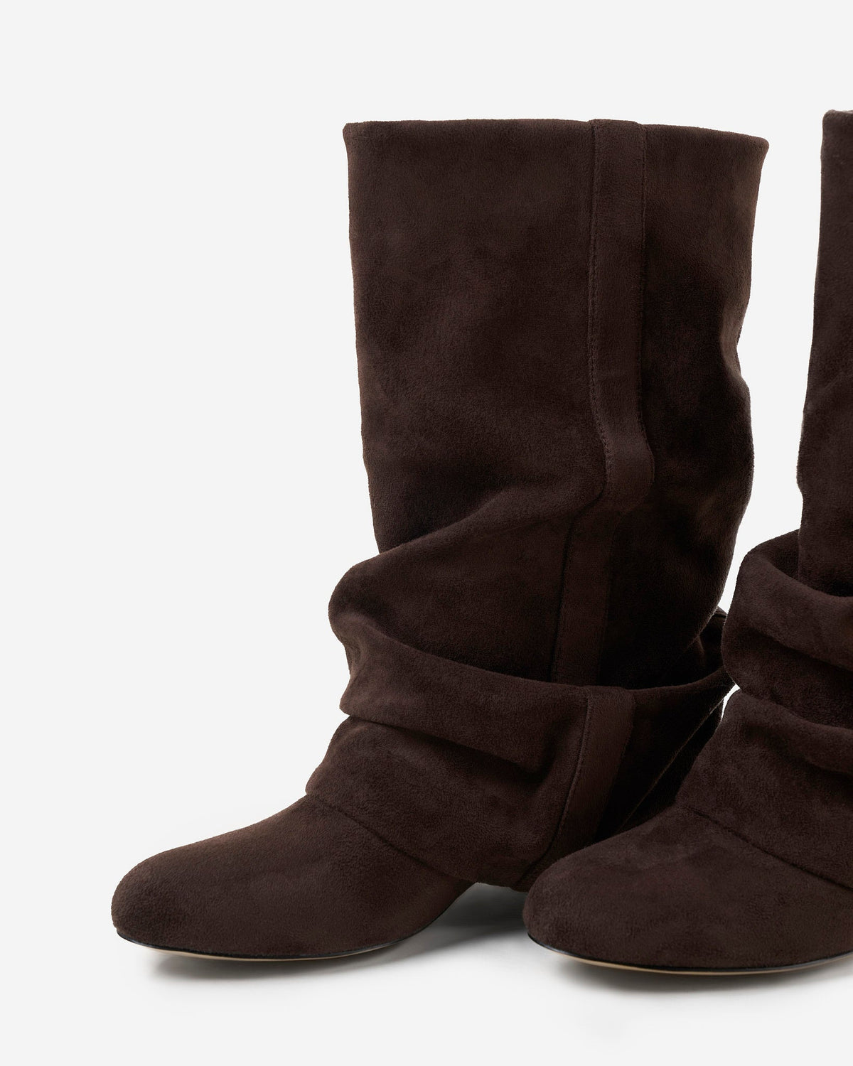 Angled close-up of the pair showing the rounded toe, the stitched strap across the ankle and the soft gathered shaft. 6