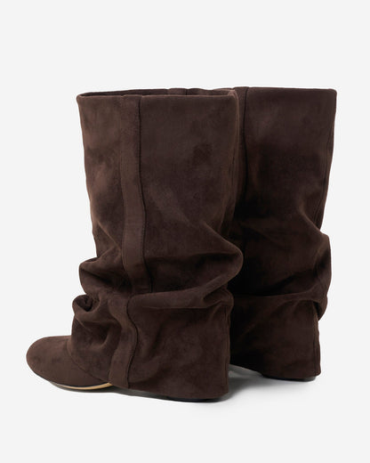 Pair of slouchy dark brown boots seen from the back and side, showing the gathered folds, seam details and low block heel. 3