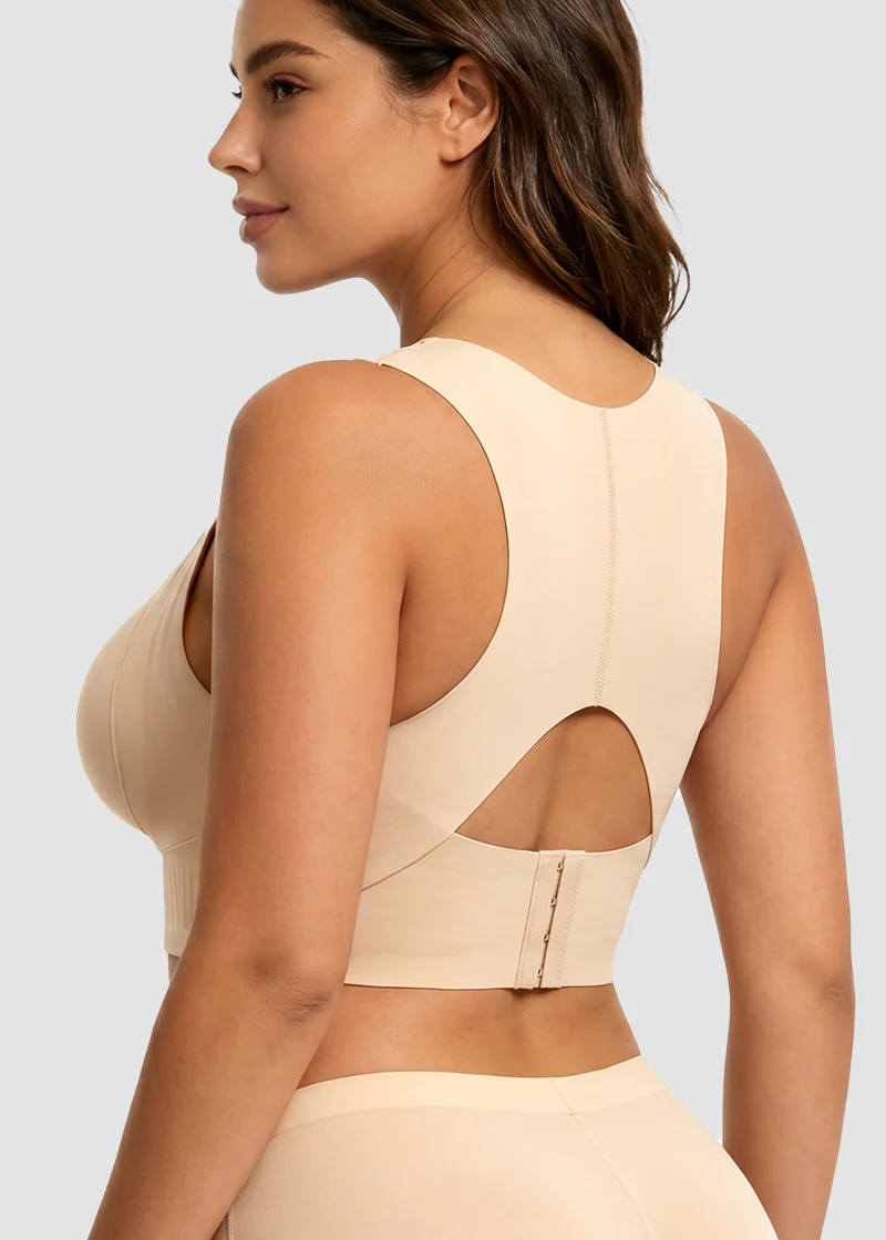 Back view of the beige bra on a model, showing the racer-style back, keyhole cut-out and hook fastening. 3