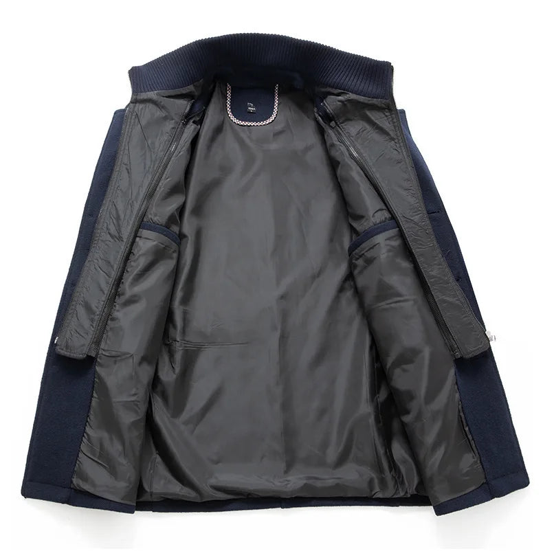 Inside of the navy overcoat opened out, showing the dark lining and the zip-in inner layer 8