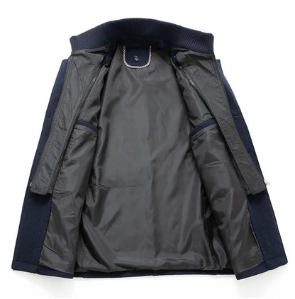 Inside of the navy overcoat opened out, showing the dark lining and the zip-in inner layer 8
