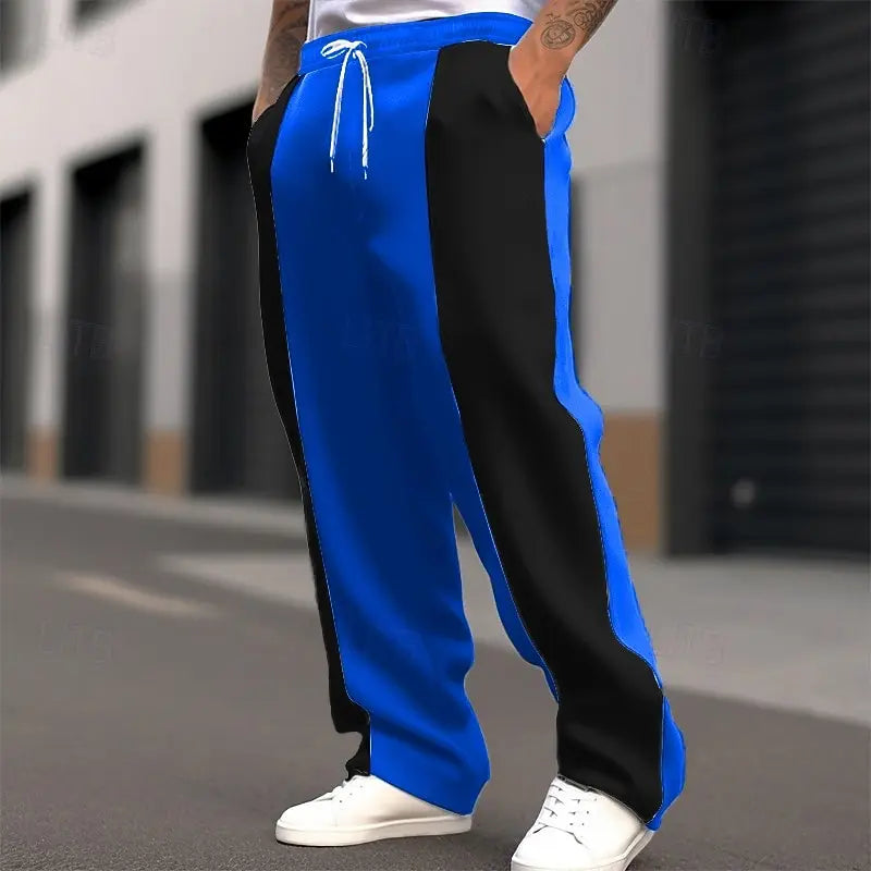 Street shot, lower body, of bright blue and black colour-block sweatpants with white drawstring 8