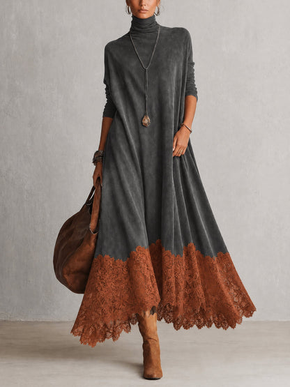 Front view of the dress in charcoal grey with a rust-orange lace hem 10