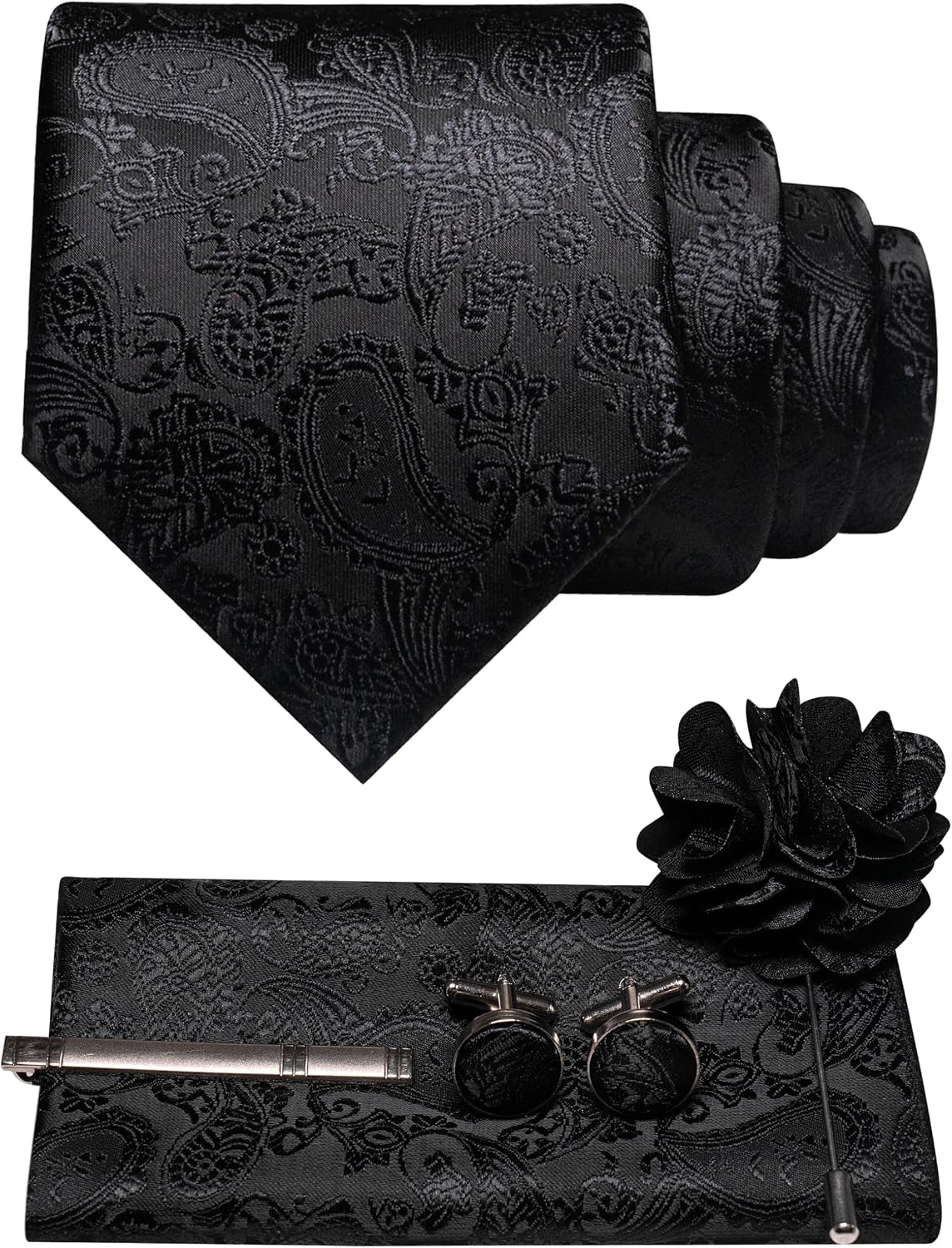 All-black paisley tie set flat lay with tonal pattern, pocket square, tie clip, cufflinks and flower lapel brooch. 37
